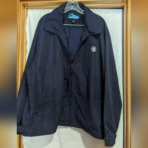 Navy jacket by Tri-Mountain. Has Smith & Wesson logo on upper left chest.